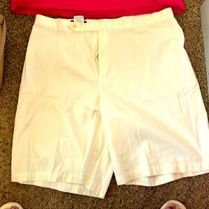 Land end women’s shorts, bright pink guns and coffee shirt